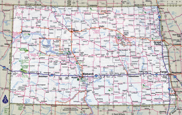 Large detailed roads and highways map of North Dakota state with national parks and cities.